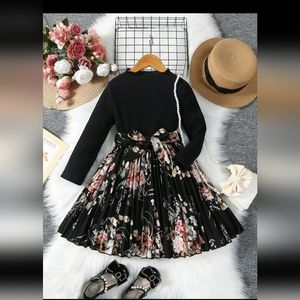 Girl's size 7 Pleated skirt belted dress.